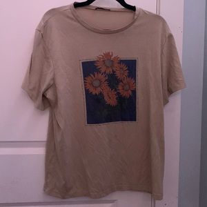 A beautiful vangogh sunflower painting on a tan  L tee